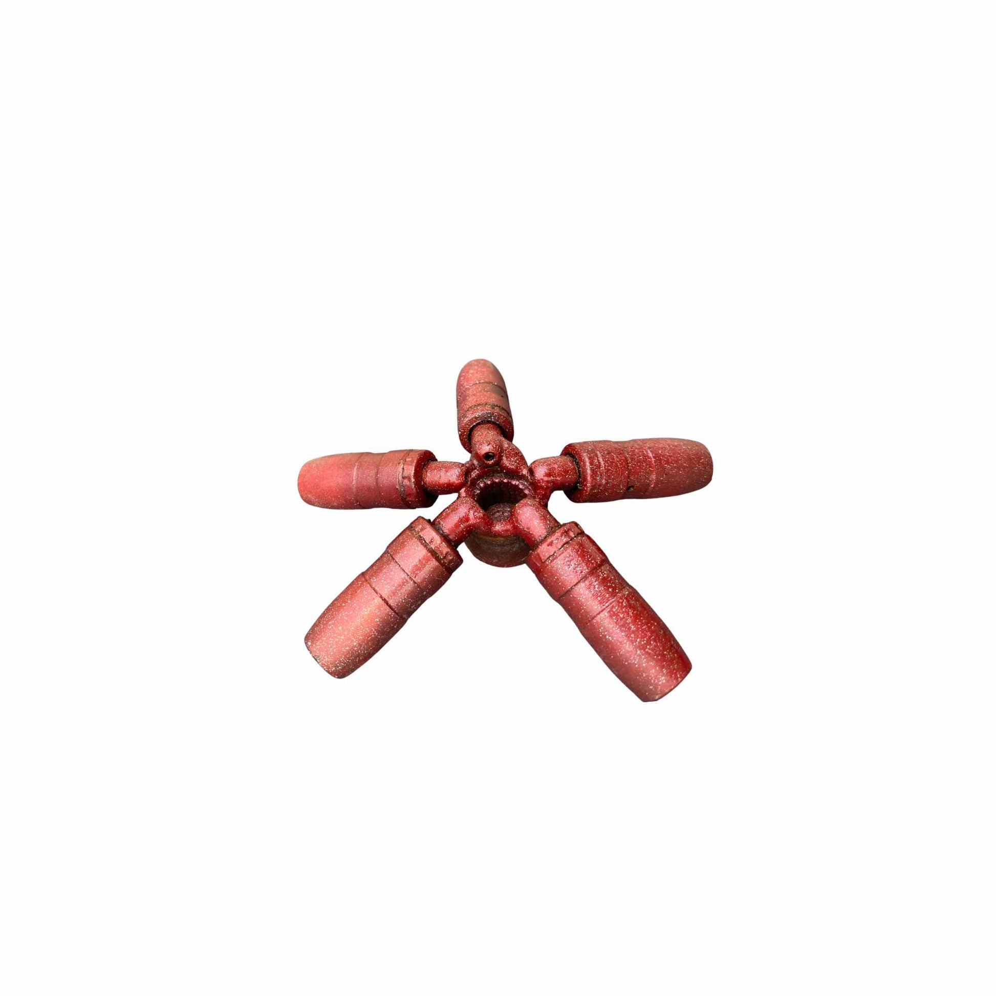 A red sea star sculpture with sparkles.