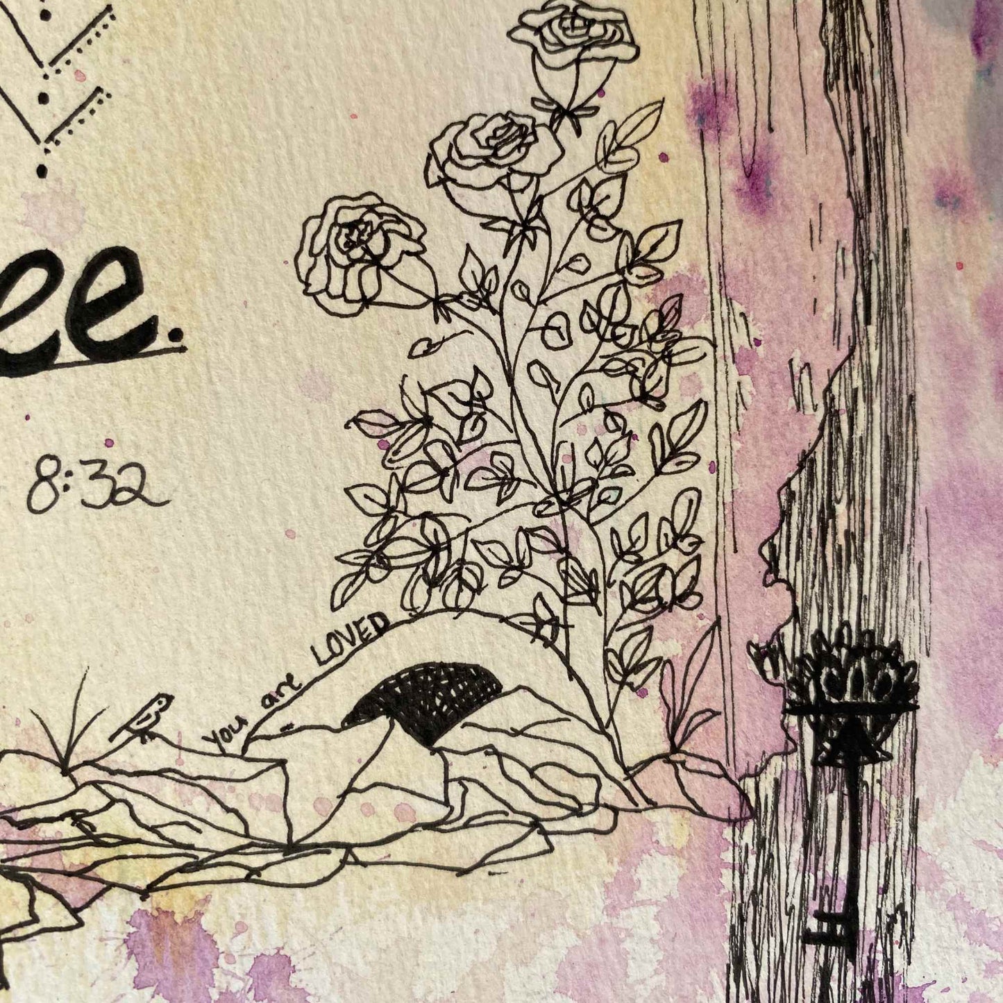 A close-up of a textured paper surface with black line drawings.