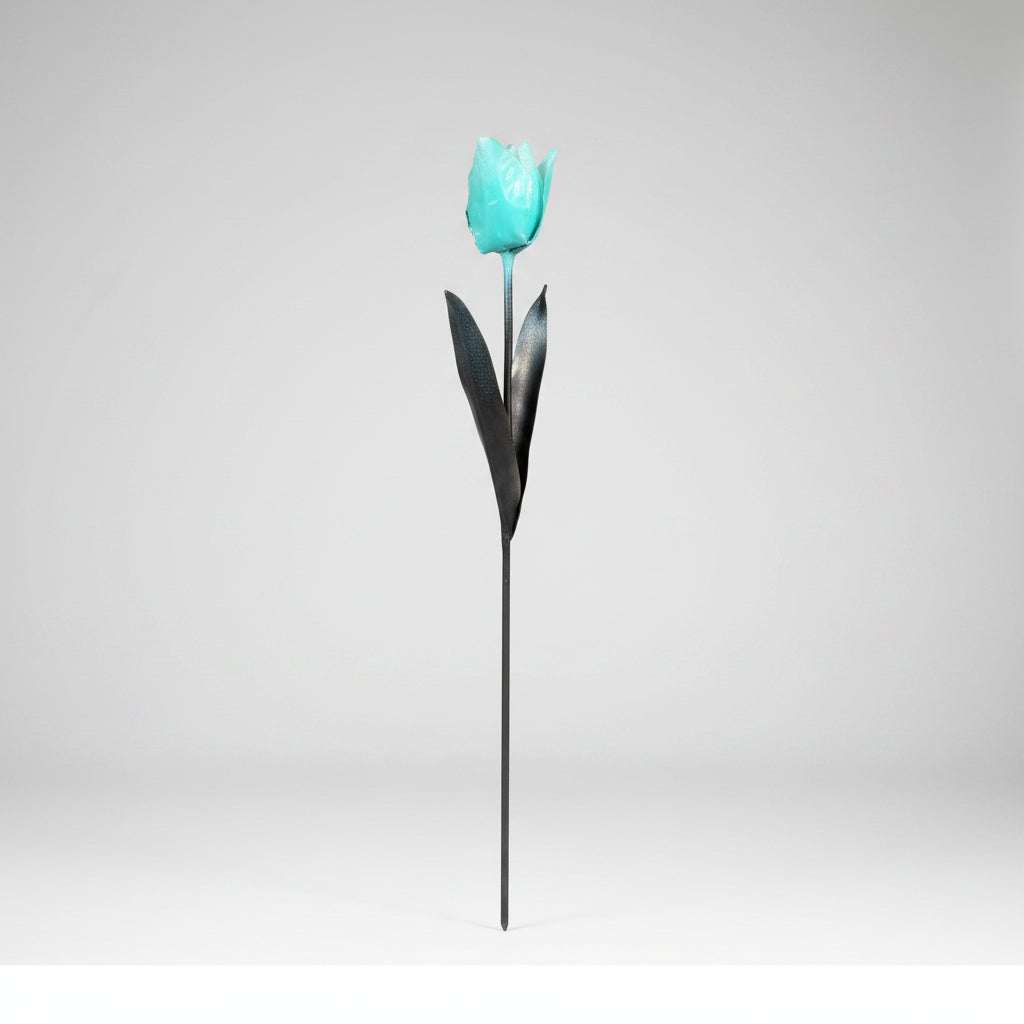 A light blue tulip metal garden art sculpture