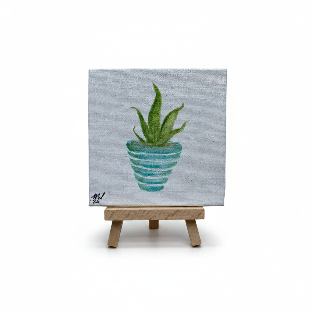A small canvas painting of a green aloe plant in a turquoise striped pot, displayed on a miniature wooden easel against a white background.
